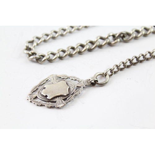 2115 - A sterling silver graduated curb link watch chain with fob - approx. gross weight 44g