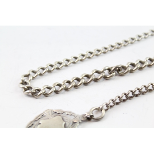 2115 - A sterling silver graduated curb link watch chain with fob - approx. gross weight 44g