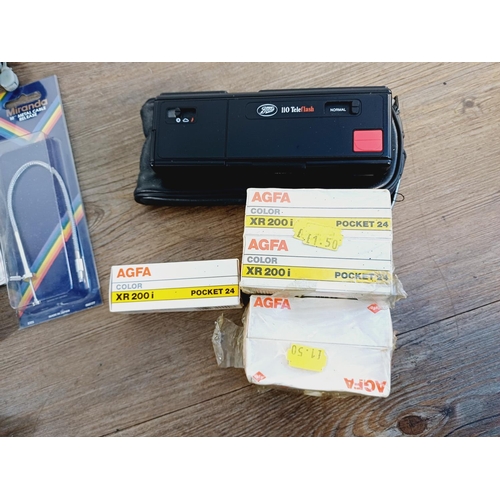 253 - A collection of cameras and photography accessories to include cased Ricoh KR-10 Super 35mm SLR came... 