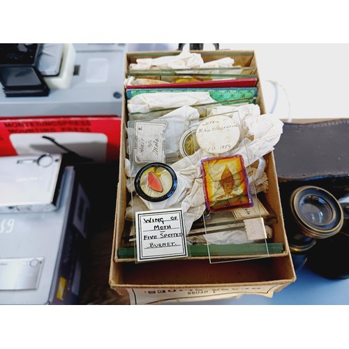 254 - A collection of items to include Milbro x250 microscope with box of slides, boxed Nikon Coolpix S9 6... 