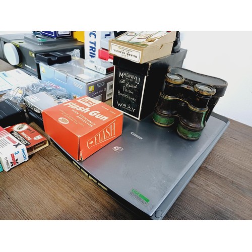 254 - A collection of items to include Milbro x250 microscope with box of slides, boxed Nikon Coolpix S9 6... 