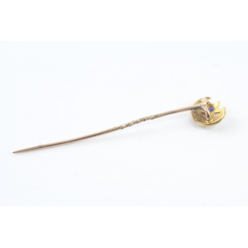 2002 - A pearl and sapphire stick pin with 15ct gold head and 9ct gold body - approx. gross weight 1.2g