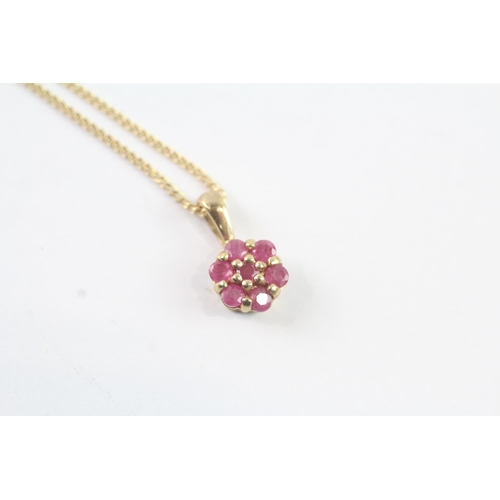 2003 - A 9ct gold ruby floral cluster pendant on chain - approx. gross weight 2.1g