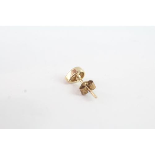 2008 - A pair of 9ct gold pearshape opal stud earrings - approx. gross weight 0.6g