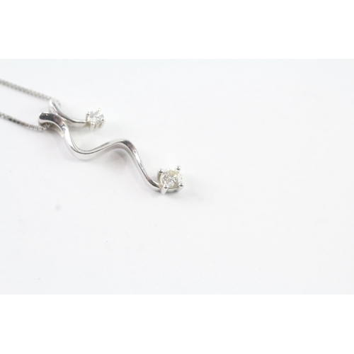 2009 - A 9ct white gold diamond pendant on chain - approx. gross weight 1.8g