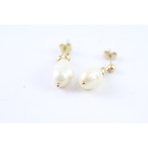 2011 - A pair of 9ct gold baroque pearl drop stud earrings - approx. gross weight 2g