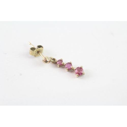 2014 - A pair of 9ct gold ruby three stone drop earrings - approx. gross weight 1g