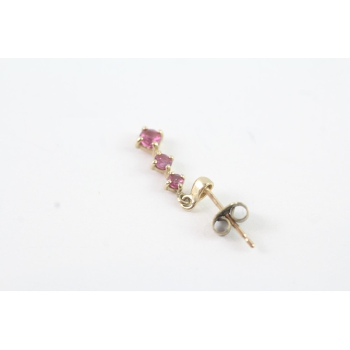 2014 - A pair of 9ct gold ruby three stone drop earrings - approx. gross weight 1g