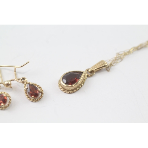 2028 - A  9ct gold garnet drop earring and necklace set - approx. gross weight 2.5g