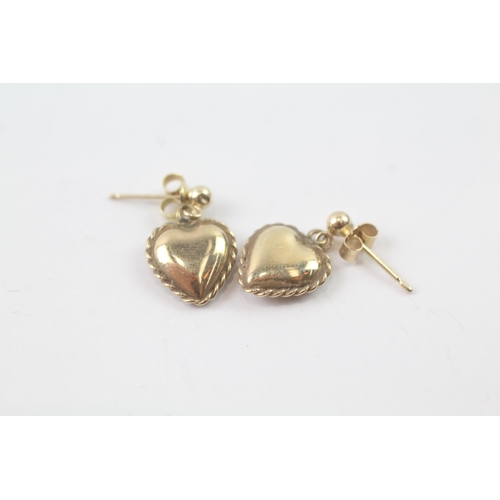 2033 - A pair of 9ct gold patterned heart shape drop earrings - approx. gross weight 1.2g