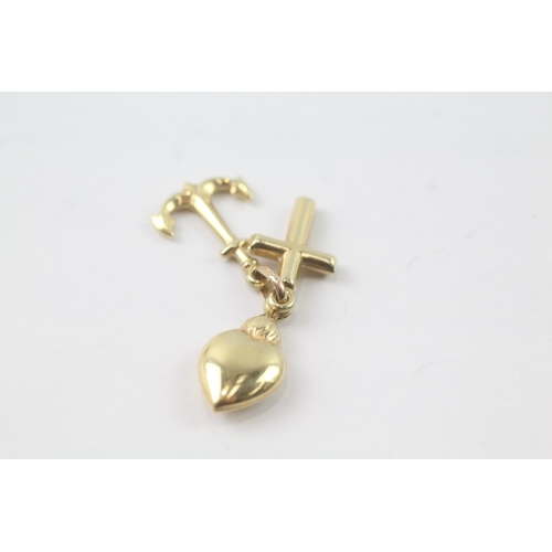 2044 - A 9ct gold love, faith and hope charm - approx. gross weight 1.6g