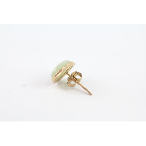 2046 - A pair of 9ct gold jade cabochon stud earrings - approx. gross weight 1.3g