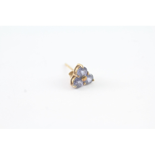 2047 - A pair of 9ct gold tanzinite stud earrings - approx. gross weight 1g