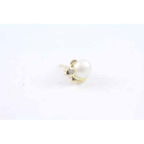 2052 - A pair of 9ct gold cultured pearl and CZ stud earrings - approx. gross weight 1.4g