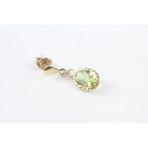 2053 - A pair of 9ct gold peridot drop single stone earrings - approx. gross weight 0.8g