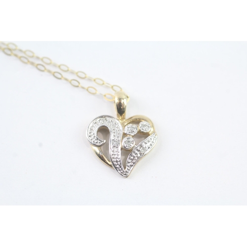 2054 - A 9ct gold diamond heart pendant on chain - approx. gross weight 1.6g