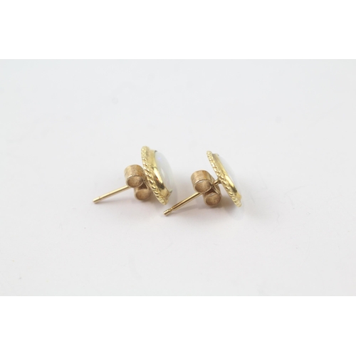 2059 - A pair of 9ct gold opal stud earrings - approx. gross weight 1.6g