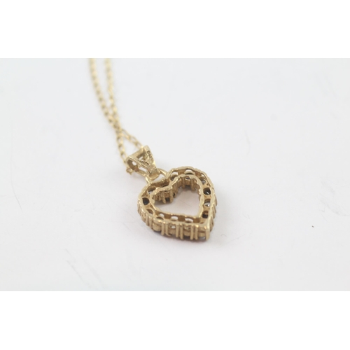 2064 - A 9ct gold sapphire and CZ heart pendant necklace - approx. gross weight 2.6g