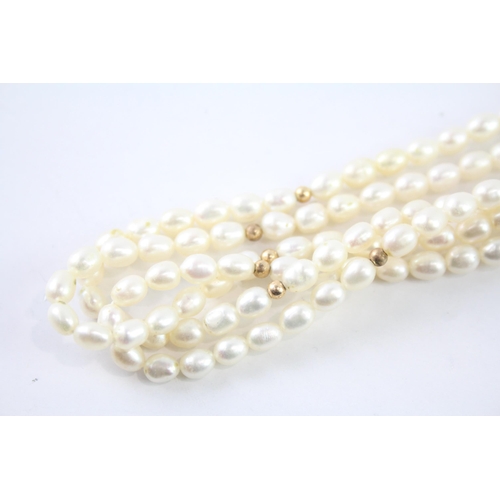 2069 - A cultured pearl necklace with 9ct gold clasp - approx. gross weight 40.7g