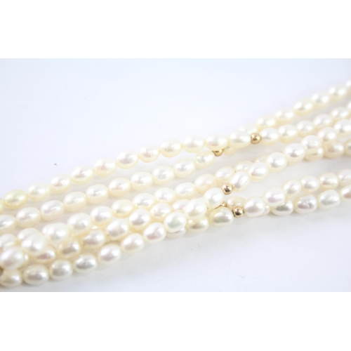 2069 - A cultured pearl necklace with 9ct gold clasp - approx. gross weight 40.7g