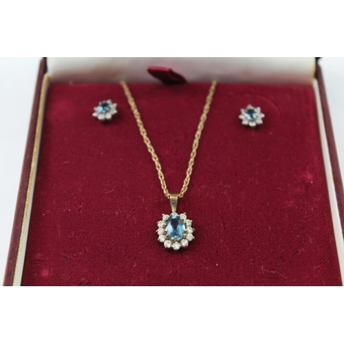 2070 - A boxed 9ct gold blue and white gemstone halo earring and necklace set - approx. gross weight 2.7g