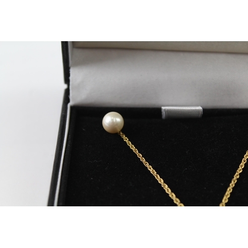 2071 - A boxed 9ct gold cultured pearl stud earring and necklace set - approx. gross weight 3.8g