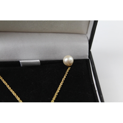 2071 - A boxed 9ct gold cultured pearl stud earring and necklace set - approx. gross weight 3.8g