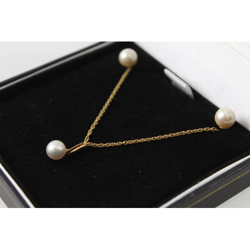 2071 - A boxed 9ct gold cultured pearl stud earring and necklace set - approx. gross weight 3.8g