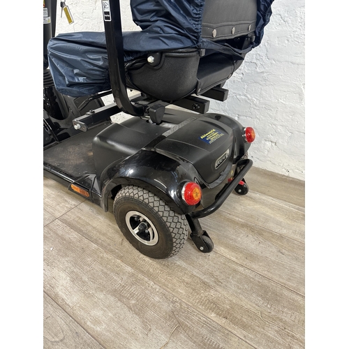 1562A - A Rascal Vantage mobility scooter with charger