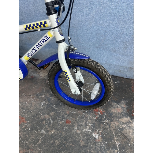 1560 - A Carson police patrol children's bike