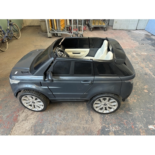 1561A - A Range Rover Sport child's electric ride on car