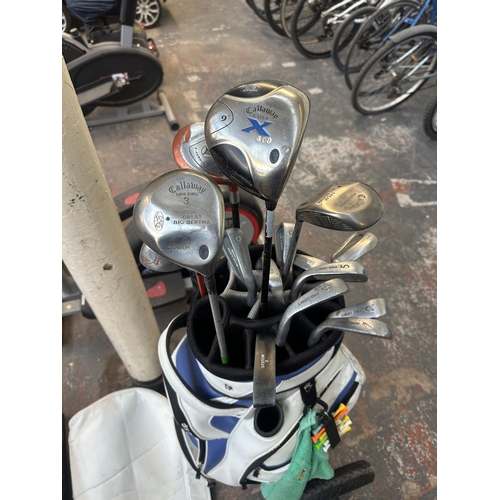 1562 - A golf bag containing clubs to include Callaway X460 driver, Callaway War Bird 3 wood, Taylor Made F... 