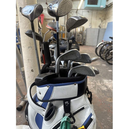 1562 - A golf bag containing clubs to include Callaway X460 driver, Callaway War Bird 3 wood, Taylor Made F... 