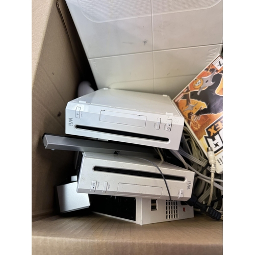 1538 - A collection of Nintendo Wii consoles and accessories to include Wii Fit board, Lego Star Wars, Lego... 