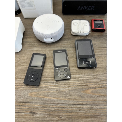 1544 - A collection of items to include Apple TV A1469, Bluetooth smart speaker, Apple earbuds etc.