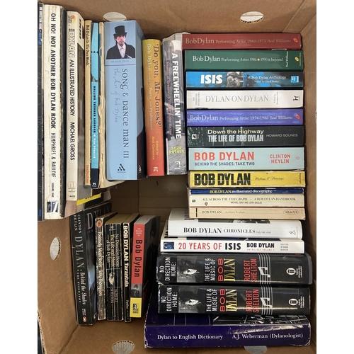 1449 - One box containing thirty three books and five DVDs all relating to american singer songwriter Bob D... 