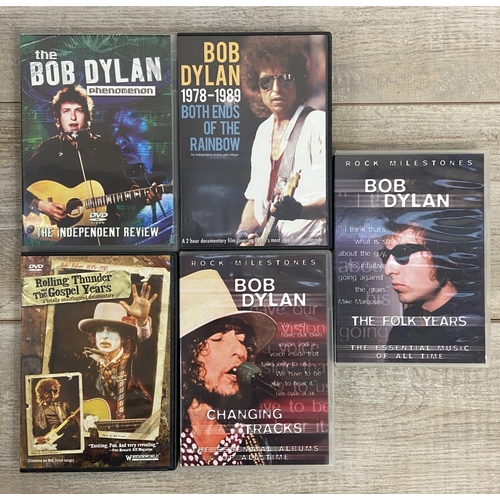 1449 - One box containing thirty three books and five DVDs all relating to american singer songwriter Bob D... 