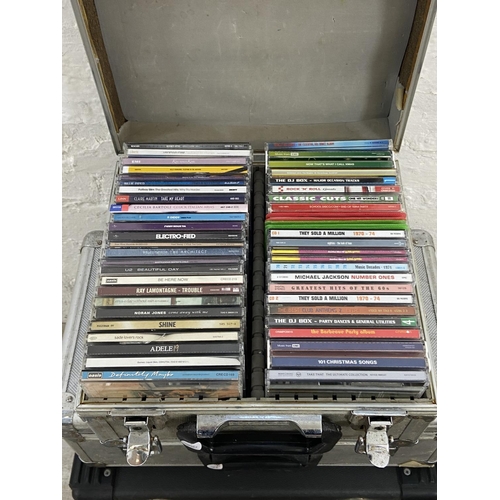 1471 - Three flight cases and two boxes containing approx. three hundred and fifty CDs includes Oasis, The ... 