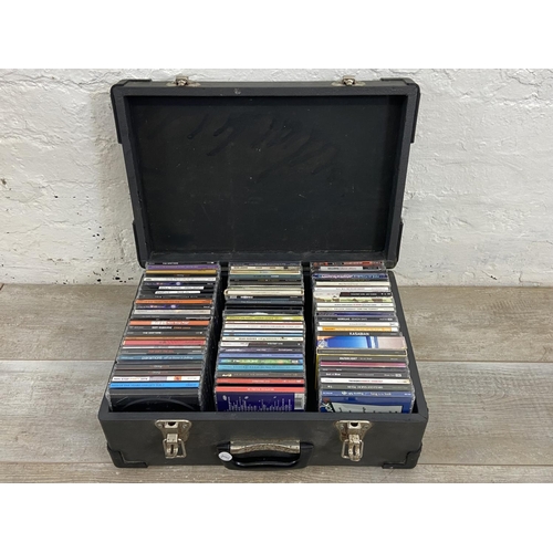 1471 - Three flight cases and two boxes containing approx. three hundred and fifty CDs includes Oasis, The ... 