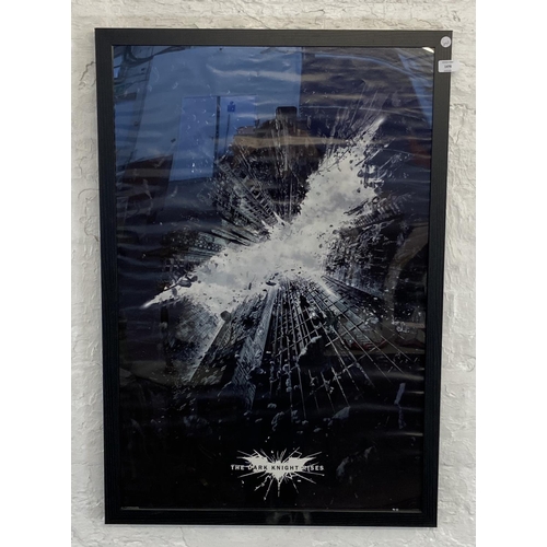 1476 - A framed DC comics movie poster Batman 'The Dark Knight Rises' measures 96.5 cm x 66 cm.