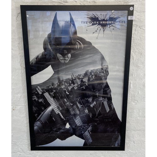 1477 - A framed DC comics movie poster Batman 'The Dark Knight Rises' measures 96.5 cm x 66 cm.