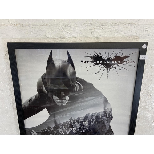 1477 - A framed DC comics movie poster Batman 'The Dark Knight Rises' measures 96.5 cm x 66 cm.