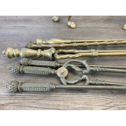 1326 - Eight Victorian and later brass fireside accessories