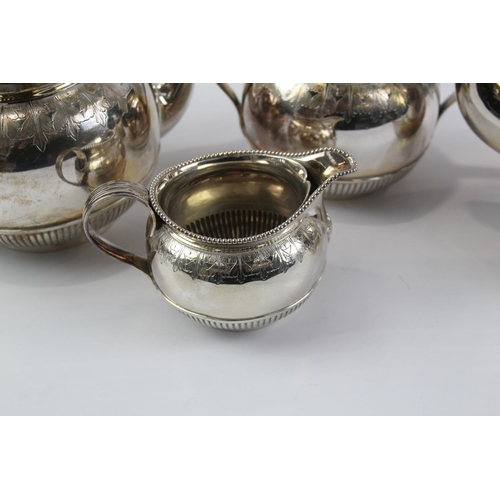 1317 - A silver plated four piece tea service