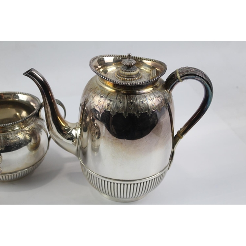 1317 - A silver plated four piece tea service