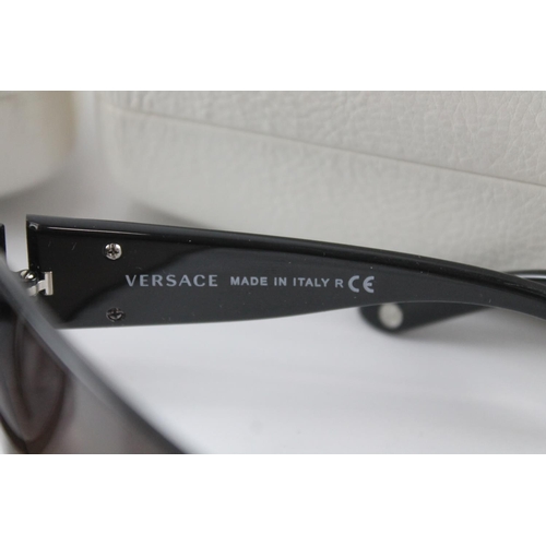 1363 - Two pairs of cased Versace sunglasses