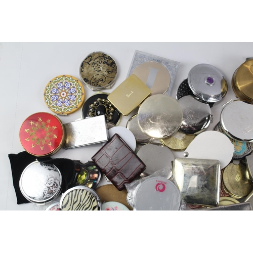 1420 - A collection of lady's powder compacts