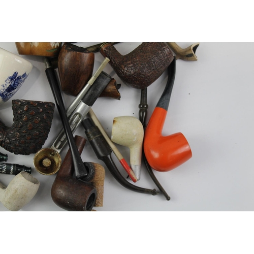 1423 - A collection of estate pipe parts to include stems etc.