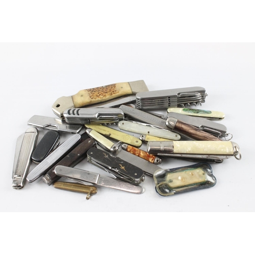 2286 - A collection of vintage pocket knives