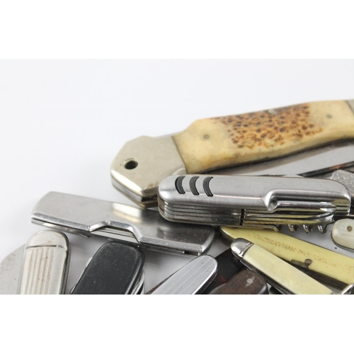 2286 - A collection of vintage pocket knives